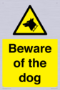 beware-of-the-dog-with-dog-warning-symbol~